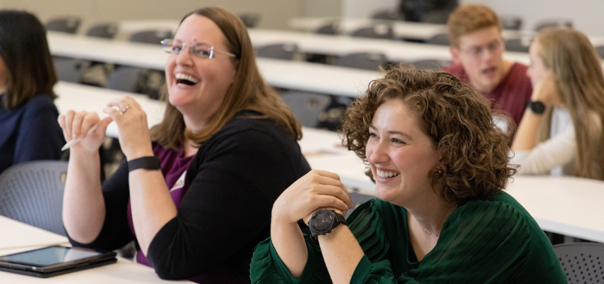 Two students excited to learn