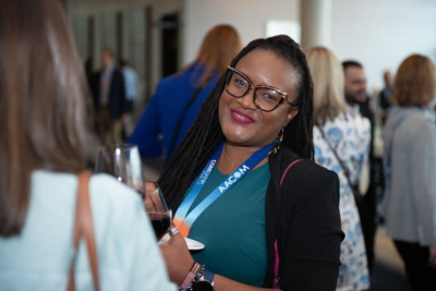 Smiling woman at Educating Leaders