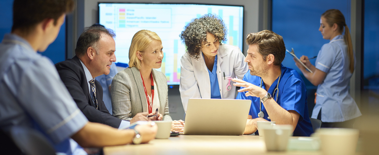 group of doctors and nurses meeting