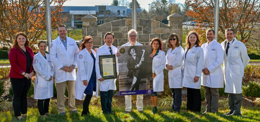 VCOM-Virginia faculty gather to recognize Osteopathic Medicine Month in Virginia.