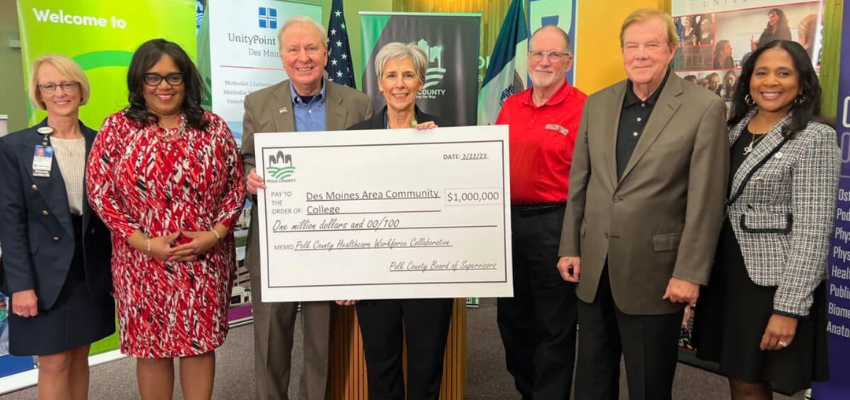 Donors hold $1 million check
