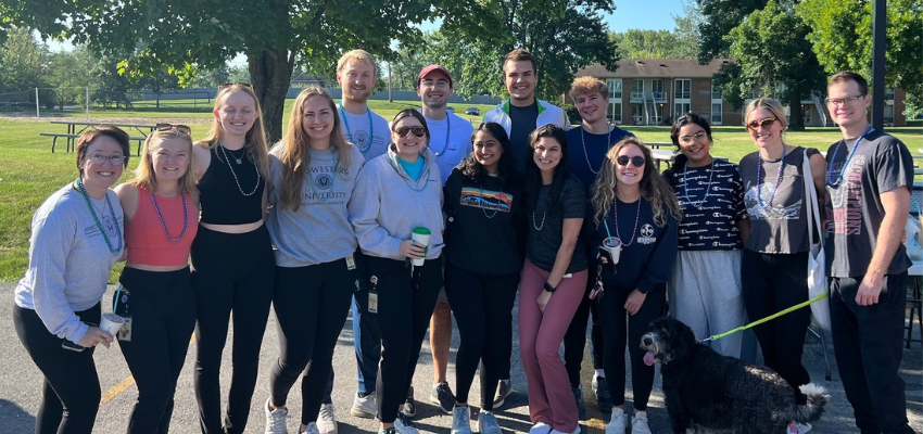 Medical students standing on campus ready to begin the walk