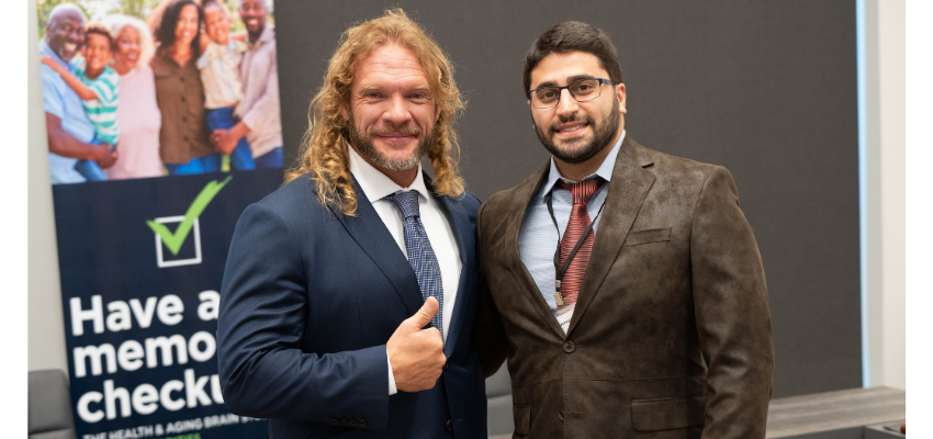 Dr. O'Bryant gives a thumbs up while standing with medical student Housini