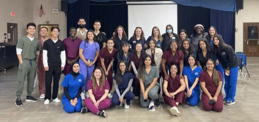 group shot of student doctors in auditorium