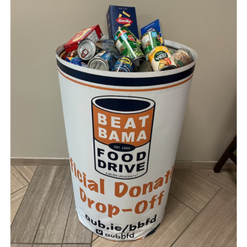 Food donation bin full of canned food