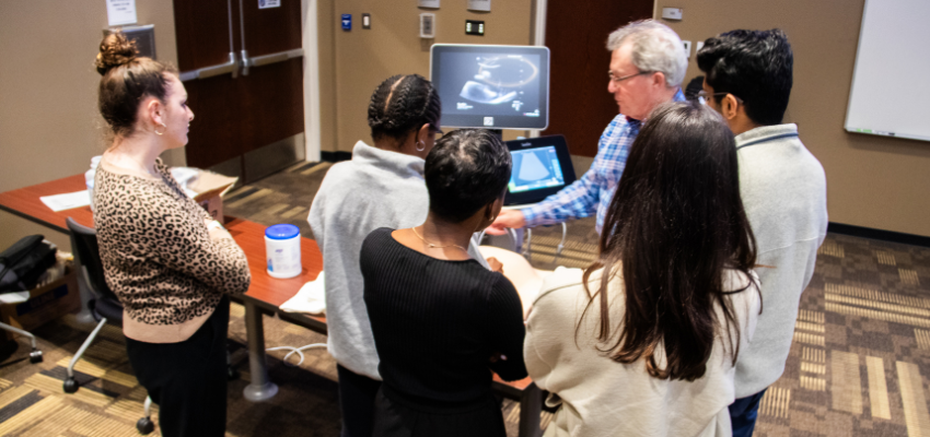 Students watch ultrasound demonstration