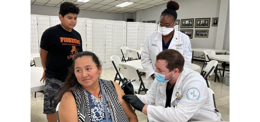 Student provides a COVID-19 vaccine