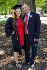 Janine with her father during her graduation