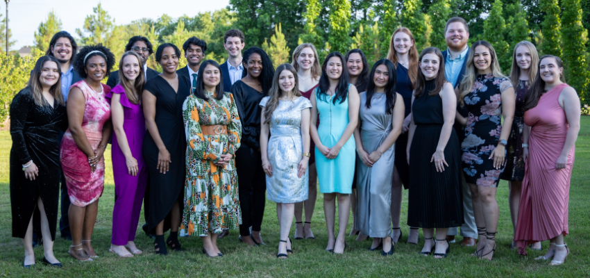 Group photo of VCOM Louisiana students in formal attire.