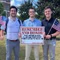 Threemedicalstudentsholdasignhonoringveteranswholosttheirlivestosuicide